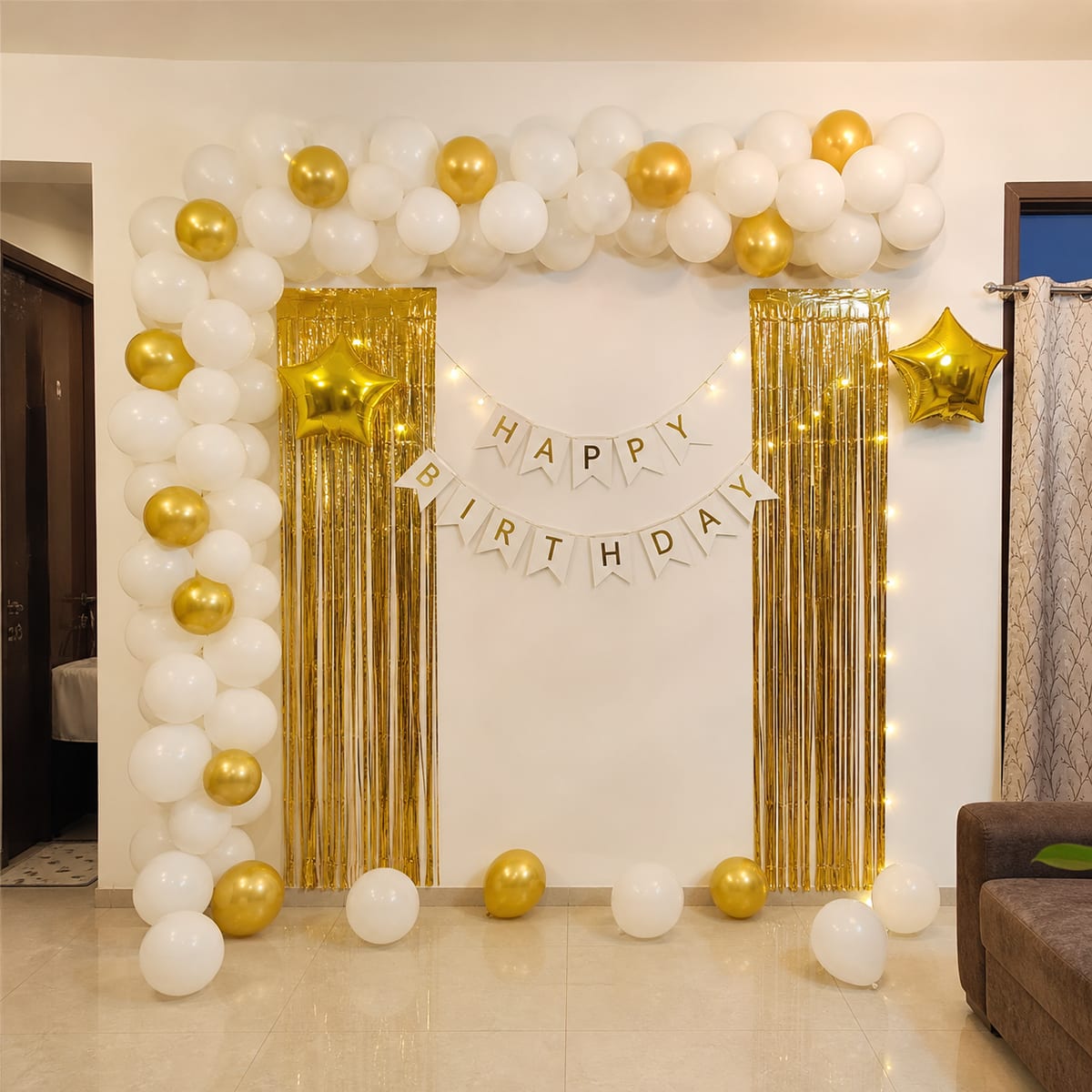 White & Gold Minimal Birthday balloon decoration setup in Delhi NCR
